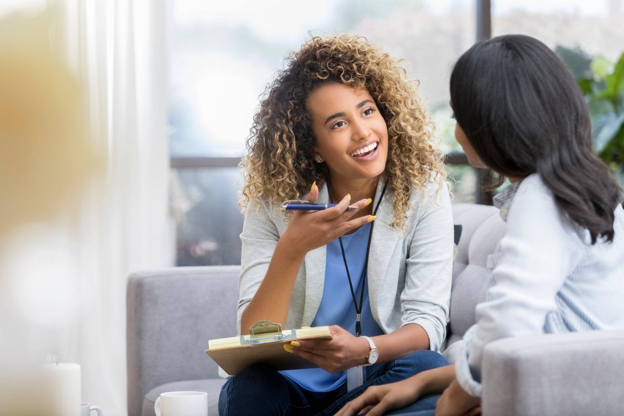 Encouraging therapist talks with young woman A Guide to Health Tips in Garland at Northstar Plaza