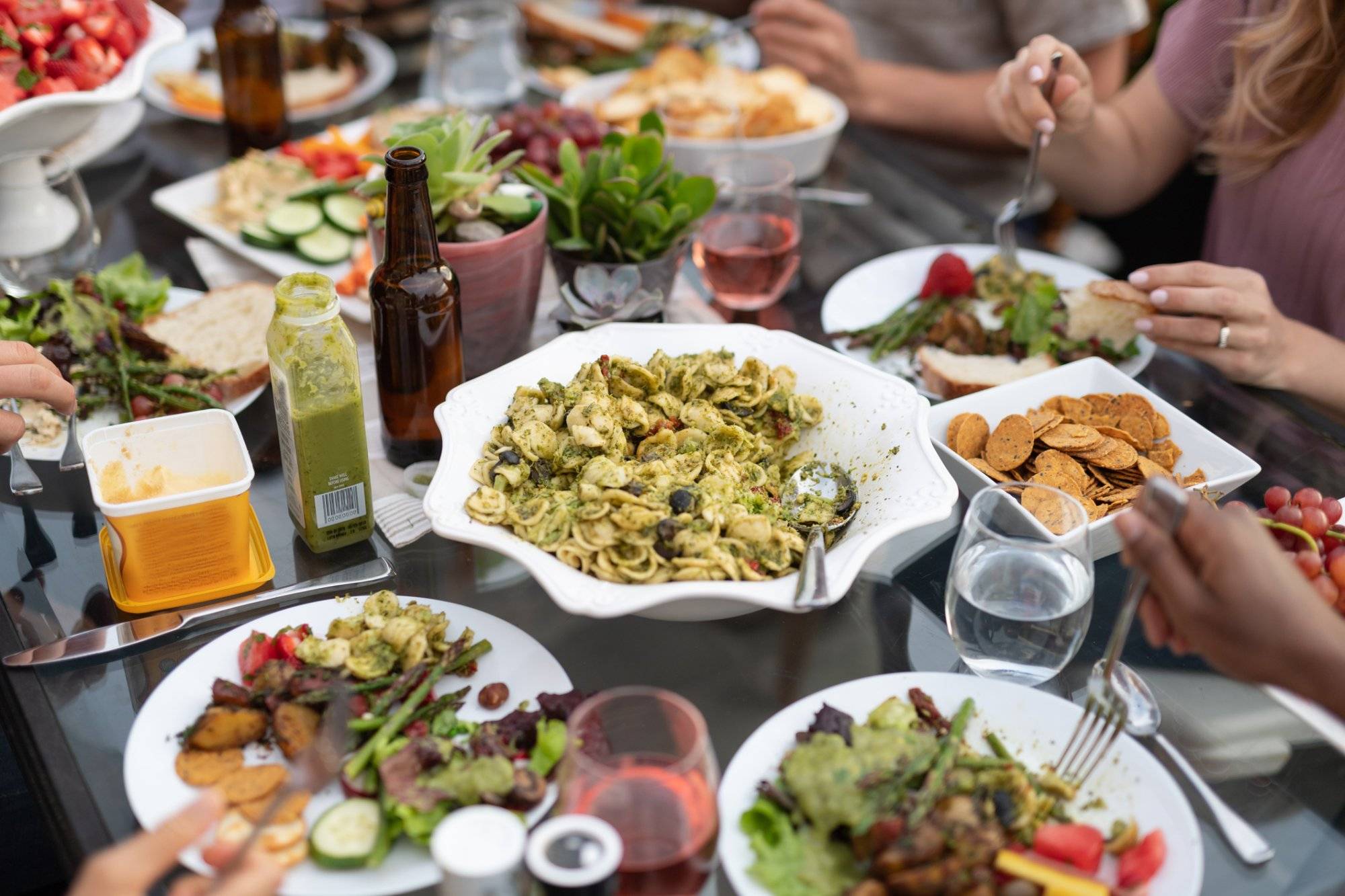 A group of young adult friends dining al fresco on a patio Discover Delicious Family Dinner in Garland at Northstar Plaza